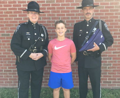 On Flag Day, Lieutenants Campbell and Chrzan proudly took…